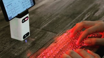 Virtual laser keyboard: Pros and cons of high tech portable device 