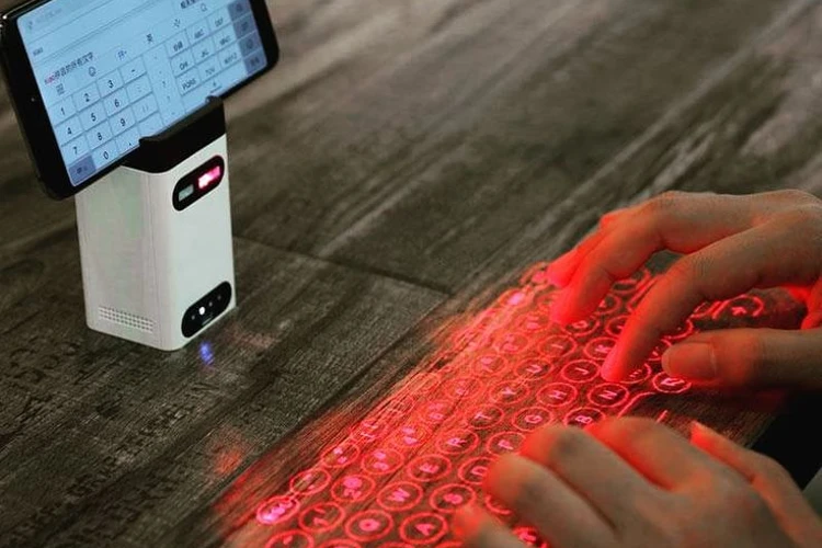 Virtual laser keyboard: Pros and cons of high tech portable device 
